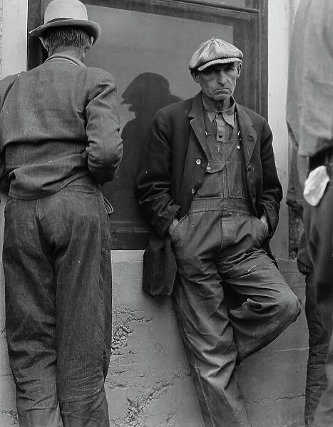 Waiting for the semimonthly relief checks at Calipatria, Imperial Valley, California, 1937. Creator: Dorothea Lange