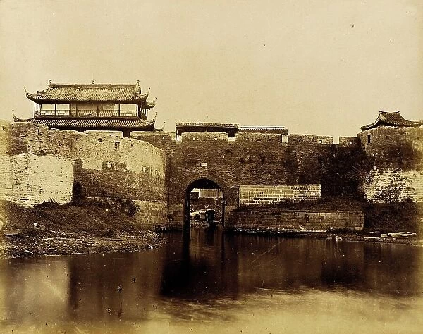 Walled River and Bridge with Buildings Above, 1860. Creator: Felice Beato