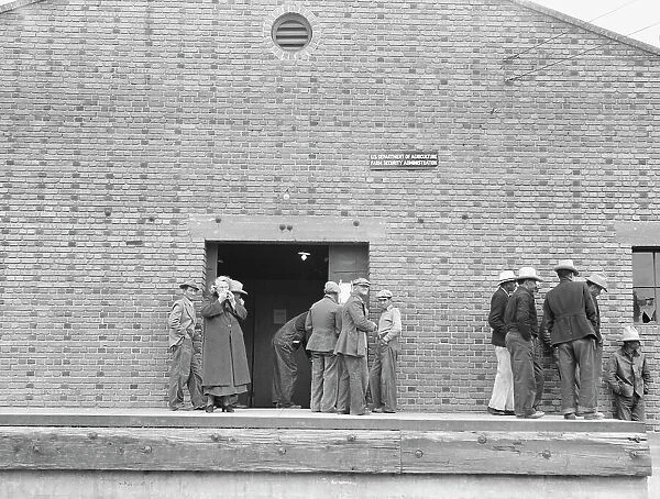 Warehouse, used as distributing office for FSA... Bakersfield, California, 1938. Creator: Dorothea Lange