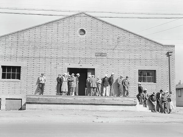 Warehouse, used as distributing office for FSA relief grants... Bakersfield, California, 1938. Creator: Dorothea Lange