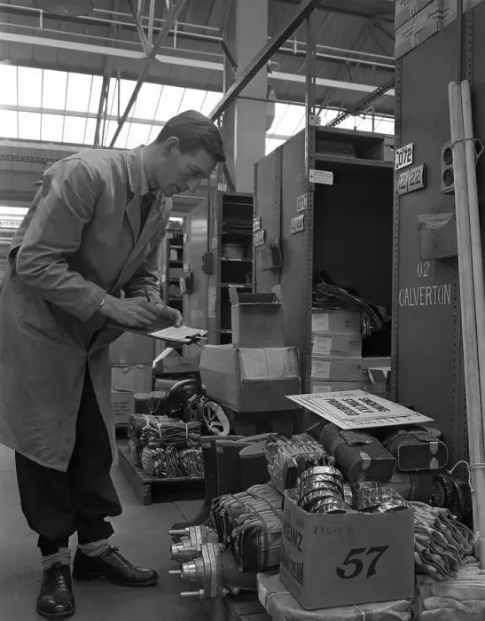 Framed Print : Warehouseman checking stock in the stores at Bestwood Colliery, North Nottinghamshire, 1962 Framed Print : Warehouseman checking stock in the stores at Bestwood Colliery, North Nottinghamshire, 1962