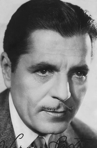 Warner Baxter, (1889-1951), American actor, c1930s-c1940s. Signed photograph