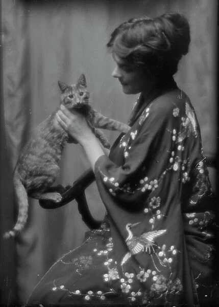 Warren, Gertrude, Miss, or Miss Jackman, with Buzzer the cat, portrait photograph, 1912 or 1913. Creator: Arnold Genthe