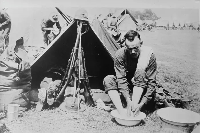 Framed Print : Washing tired feet, 1918. Creator: Bain News Service