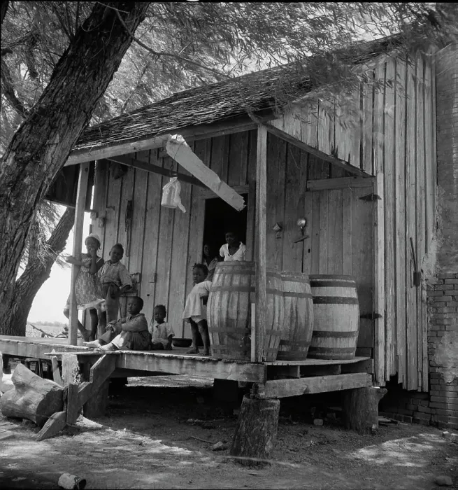 Framed Print : Water barrels on plantation cabin in Brazos riverbottoms, near Bryan, Texas, 1938. Creator: Dorothea Lange Framed Print : Water barrels on plantation cabin in Brazos riverbottoms, near Bryan, Texas, 1938. Creator: Dorothea Lange