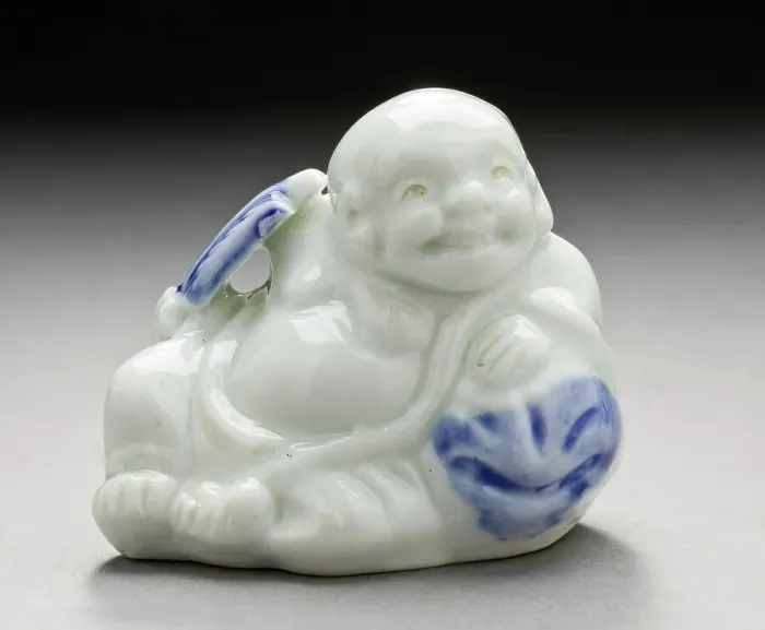 Framed Print : Water Dropper in the Form of Hotei on His Bag Holding a Fan, 19th century. Creator: Unknown Framed Print : Water Dropper in the Form of Hotei on His Bag Holding a Fan, 19th century. Creator: Unknown