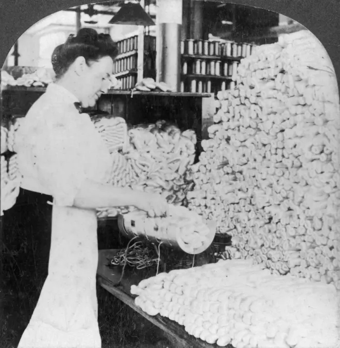Framed Print : Weighing and sorting raw silk skeins, South Manchester, Connecticut, USA, early 20th century. Artist: Keystone View Company Framed Print : Weighing and sorting raw silk skeins, South Manchester, Connecticut, USA, early 20th century. Artist: Keystone View Company