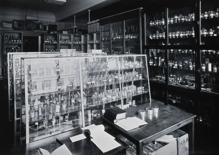 Framed Print : The Wellcome Building, Euston Road, London: working area in the materia medica stores, c1910s. Creator: Unknown Framed Print : The Wellcome Building, Euston Road, London: working area in the materia medica stores, c1910s. Creator: Unknown