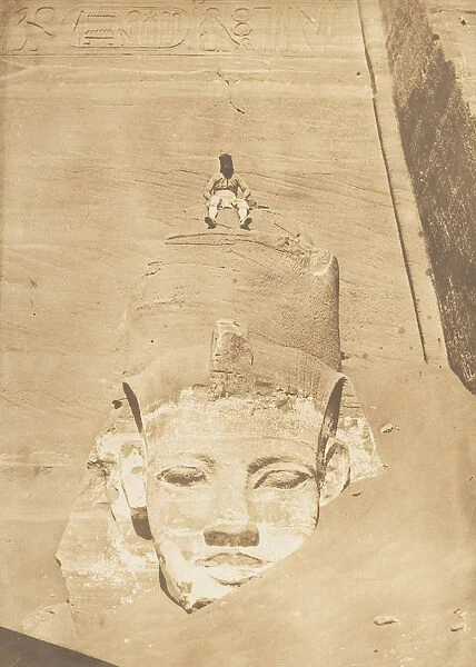 Westernmost Colossus of the Temple of Re, Abu Simbel, 1850. Creator: Maxime du Camp