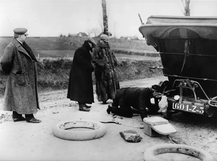 Framed Print : Wheel change by chauffeur on Lord Northcliffes 1908 Mercedes. Creator: Unknown Framed Print : Wheel change by chauffeur on Lord Northcliffes 1908 Mercedes. Creator: Unknown