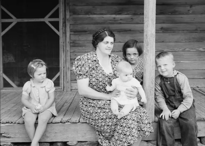 Framed Print : Wife and children of tobacco sharecropper on front porch, Person County, North Carolina, 1939. Creator: Dorothea Lange Framed Print : Wife and children of tobacco sharecropper on front porch, Person County, North Carolina, 1939. Creator: Dorothea Lange
