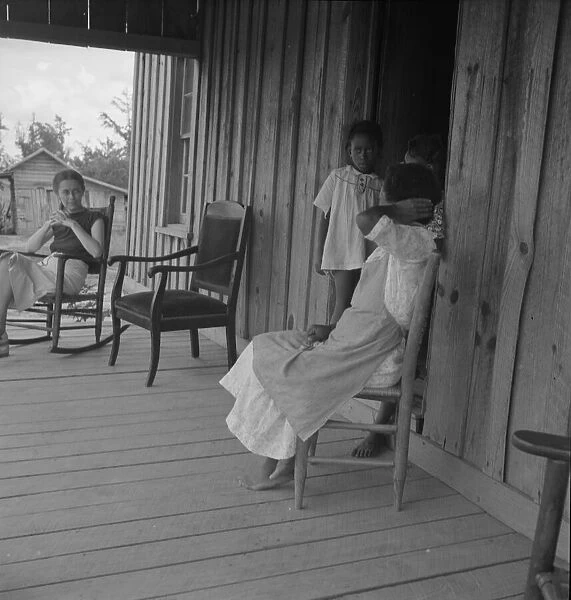 Wife of tenant farmer with two of her six children... Chatham County, N Carolina, 1939. Creator: Dorothea Lange