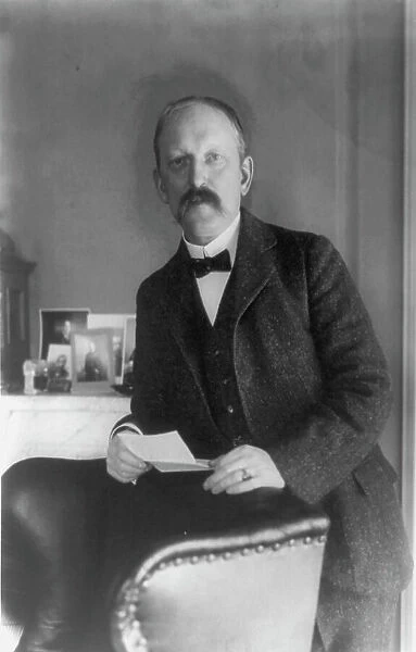 William Woodville Rockhill, half-length portrait, standing, facing left, between 1890 and 1910. Creator: Frances Benjamin Johnston