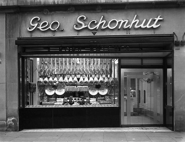 Window of George Schonhuts butchers shop, Barnsley, South Yorkshire, 1955. Artist