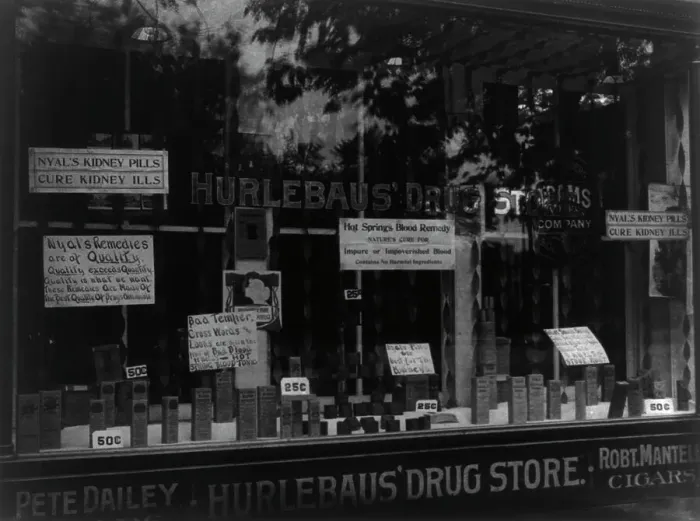Framed Print : Front window - Hurlebaus Drug Store, c1900. Creator: Frances Benjamin Johnston Framed Print : Front window - Hurlebaus Drug Store, c1900. Creator: Frances Benjamin Johnston