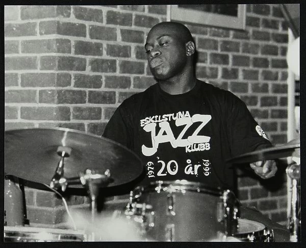 Winston Clifford on drums at The Fairway, Welwyn Garden City, Hertfordshire, 18 February 2001