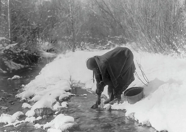 A winter day-Apsaroke, c1908. Creator: Edward Sheriff Curtis