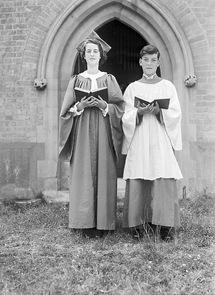 Woman and boy chorister, (Isle of Wight?), c1935. Creator: Kirk & Sons of Cowes