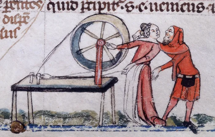 Framed Print : A woman being distracted from her spinning, early 14th century. Creator: Unknown Framed Print : A woman being distracted from her spinning, early 14th century. Creator: Unknown