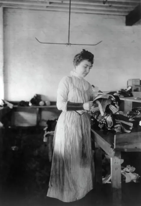 Framed Print : Woman distributing work in a shoe factory, Lynn, Mass. (1895?). Creator: Frances Benjamin Johnston Framed Print : Woman distributing work in a shoe factory, Lynn, Mass. (1895?). Creator: Frances Benjamin Johnston