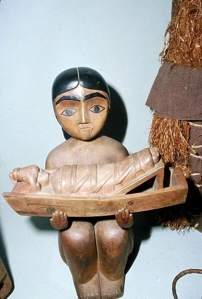 Woman holding Cradle, Salish Tribe, Pacific Northwest Coast Indian
