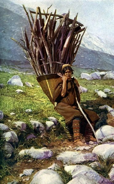 Woman with a load of wood, Afghanistan, c1924. Artist: Colonel JG Edwards