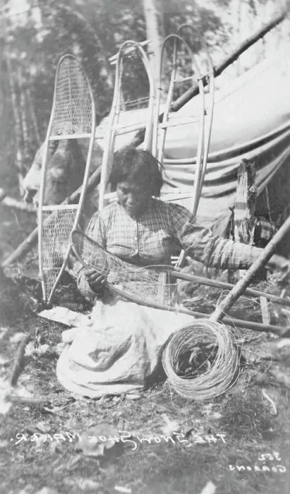 Framed Print : Woman making snow shoes, between c1900 and c1930. Creator: Unknown Framed Print : Woman making snow shoes, between c1900 and c1930. Creator: Unknown