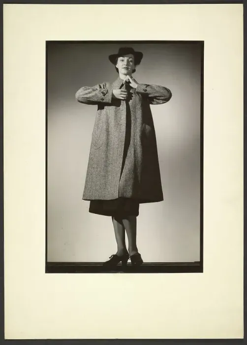 Framed Print : Woman modeling a coat, early 1940s. Creator: Gunther Krampf Framed Print : Woman modeling a coat, early 1940s. Creator: Gunther Krampf