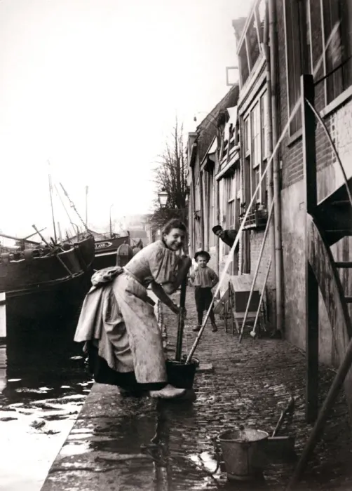 Framed Print : Woman mopping the street, Dordrecht, Netherlands, 1898. Artist: James Batkin Framed Print : Woman mopping the street, Dordrecht, Netherlands, 1898. Artist: James Batkin