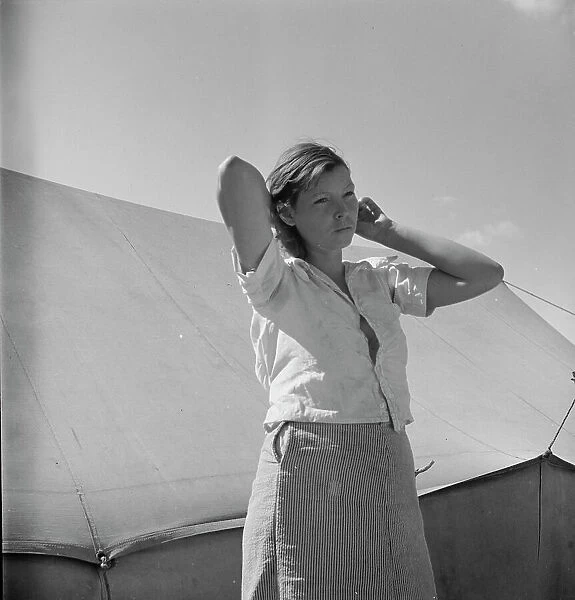 Woman in pea picker's camp, California, 1937. Creator: Dorothea Lange