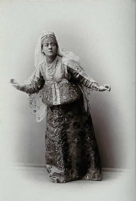 Framed Print : A woman posing in a photographic studio, wearing an embriodered dress, c1900s. Creator: Unknown Framed Print : A woman posing in a photographic studio, wearing an embriodered dress, c1900s. Creator: Unknown