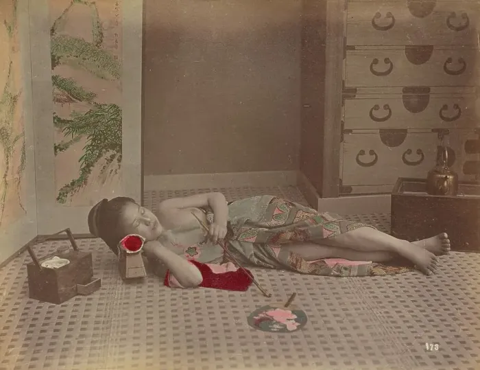 Framed Print : Woman Reclining with Pipe, 1870s-1890s. Creator: Kusakabe Kimbei Framed Print : Woman Reclining with Pipe, 1870s-1890s. Creator: Kusakabe Kimbei