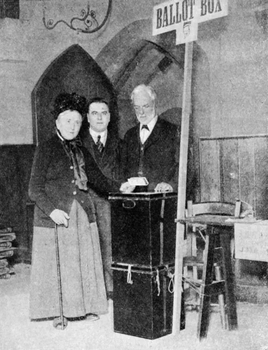 Framed Print : A woman recording her vote at the ballot box, c1922 Framed Print : A woman recording her vote at the ballot box, c1922