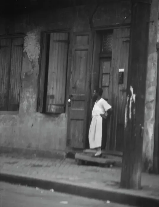 Framed Print : Woman standing in a doorway in the French Quarter, New Orleans, between 1920 and 1926. Creator: Arnold Genthe Framed Print : Woman standing in a doorway in the French Quarter, New Orleans, between 1920 and 1926. Creator: Arnold Genthe