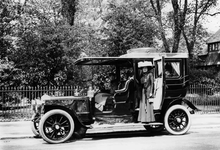 Framed Print : Woman stands by a 1907 / 8 Daimler Framed Print : Woman stands by a 1907 / 8 Daimler