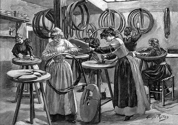 Women making pneumatic tyres for bicycles, France, 1896