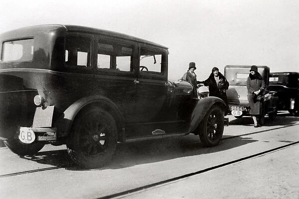 Women and parked cars, 1930