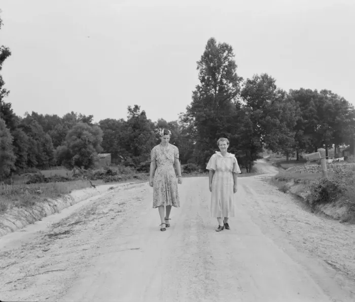 Framed Print : Women walking down the road to see a sick neighbor, Person County, North Carolina, 1939. Creator: Dorothea Lange Framed Print : Women walking down the road to see a sick neighbor, Person County, North Carolina, 1939. Creator: Dorothea Lange