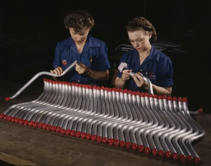 Framed Print : Two women workers are shown capping and inspecting tubing... Vultees Nashville... Tennessee, 1943. Creator: Alfred T Palmer