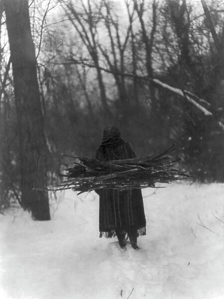 The wood gatherer-Sioux, c1908. Creator: Edward Sheriff Curtis