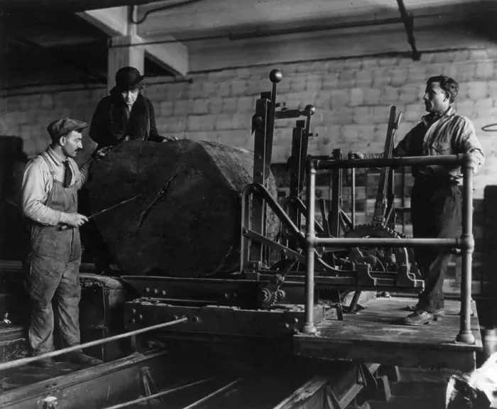 Framed Print : Wooden box industry - Mrs. Graham inspecting log on machinery with two workmen standing by, c1910. Creator: Frances Benjamin Johnston Framed Print : Wooden box industry - Mrs. Graham inspecting log on machinery with two workmen standing by, c1910. Creator: Frances Benjamin Johnston