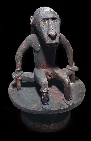 Wooden figure of a sea spirit, with head in the form of a shark, from the Solomon Islands