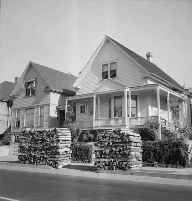 Framed Print : Woodpiles along the street are a characteristic of Portland, Oregon, 1939. Creator: Dorothea Lange Framed Print : Woodpiles along the street are a characteristic of Portland, Oregon, 1939. Creator: Dorothea Lange