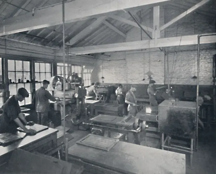 Framed Print : At Work in the Foundry. Making Wax Moulds of the Pages, 1917 Framed Print : At Work in the Foundry. Making Wax Moulds of the Pages, 1917