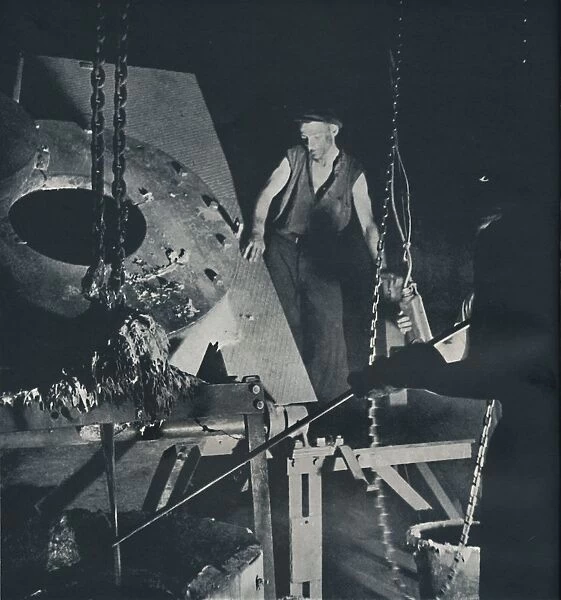 Worker in an aircraft factory (preparation of alloy), 1941. Artist: Cecil Beaton