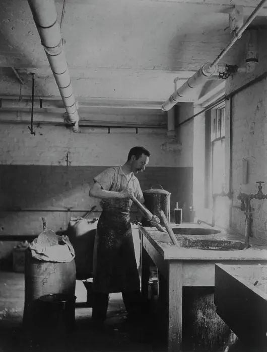Framed Print : Worker prepares gum for postage stamps in the Stamp Division at the Bureau of Engraving... c1895. Creator: Frances Benjamin Johnston Framed Print : Worker prepares gum for postage stamps in the Stamp Division at the Bureau of Engraving... c1895. Creator: Frances Benjamin Johnston