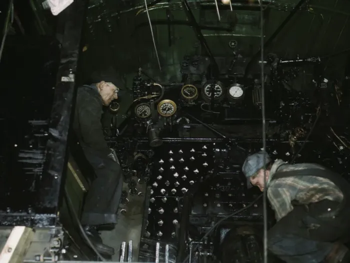 Framed Print : Working on the cab of a locomotive brought in for repair at the C & NW RR, Chicago, Ill. 1942. Creator: Jack Delano Framed Print : Working on the cab of a locomotive brought in for repair at the C & NW RR, Chicago, Ill. 1942. Creator: Jack Delano