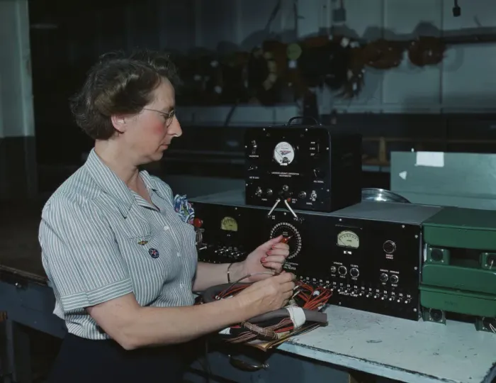 Framed Print : Working with the electric wiring at Douglas Aircraft Company, Long Beach, Calif. 1942. Creator: Alfred T Palmer Framed Print : Working with the electric wiring at Douglas Aircraft Company, Long Beach, Calif. 1942. Creator: Alfred T Palmer