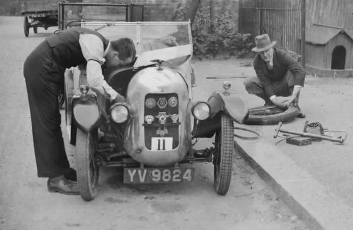 Framed Print : Working on the engine of E Martins Austin Swallow at the North West London Motor Club Trial, 1929 Framed Print : Working on the engine of E Martins Austin Swallow at the North West London Motor Club Trial, 1929