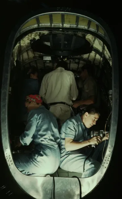 Framed Print : Working inside fuselage of a Liberator Bomber, Consolidated Aircraft Corp. Fort Worth, Texas, 1942. Creator: Howard Hollem Framed Print : Working inside fuselage of a Liberator Bomber, Consolidated Aircraft Corp. Fort Worth, Texas, 1942. Creator: Howard Hollem